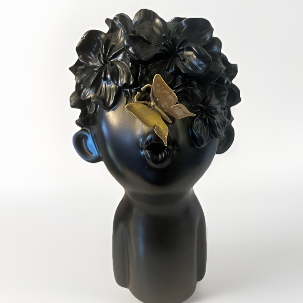 11.5-inch Modern black sculpture features a captivating design of a butterfly